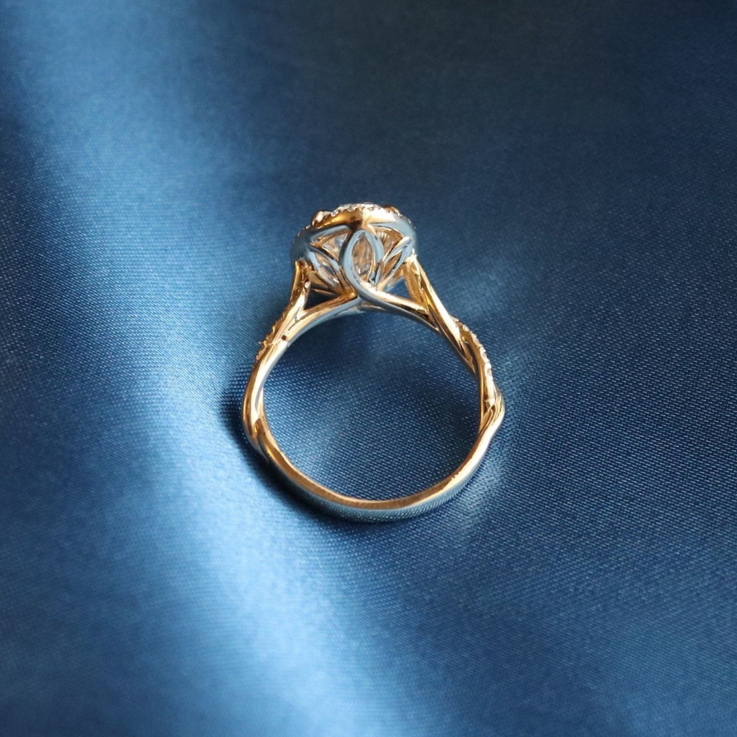 classic oval cut moissanite diamond halo ring with pave band in gold ring