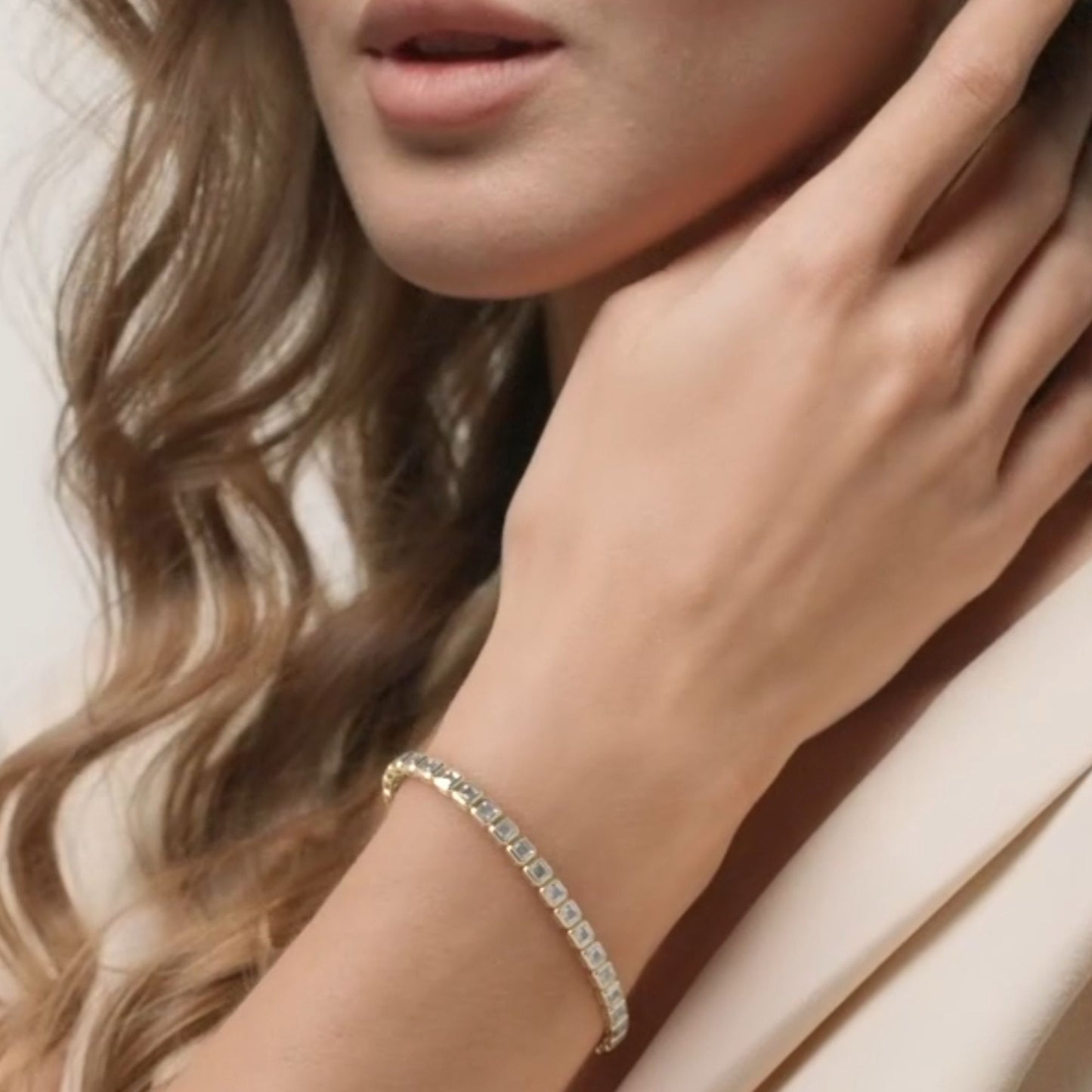 close-up of a woman's hand wearing a bracelet with a neutral