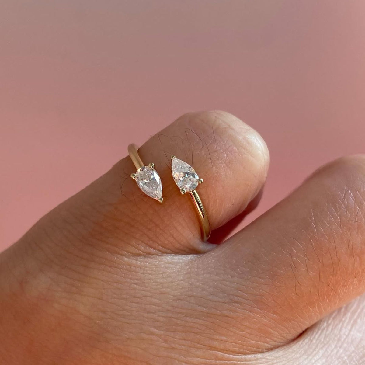 1.00 tcw elegant open bypass moissanite diamond pear cut diamond ring in minimalist double stone ring