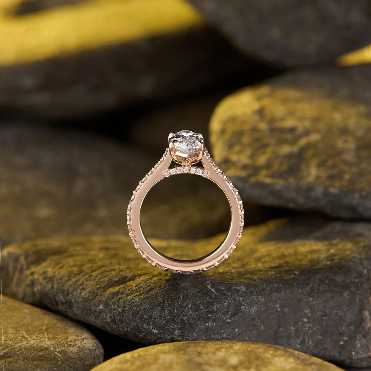 elegant marquise cut solitaire moissanite diamond engagement ring with sparkling pavé diamond band for timeless luxury and bridal beauty