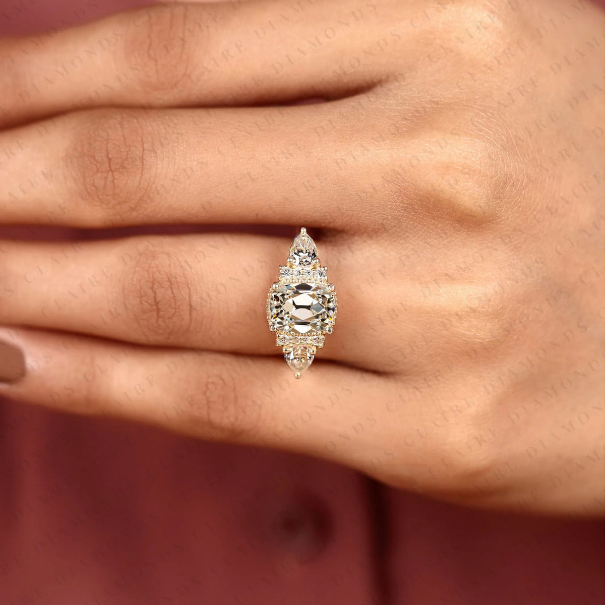 old mine elongated cushion cut moissanite engagement ring, milgrain bezel setting, pear side stone halo, yellow gold vintage inspired bridal ring
