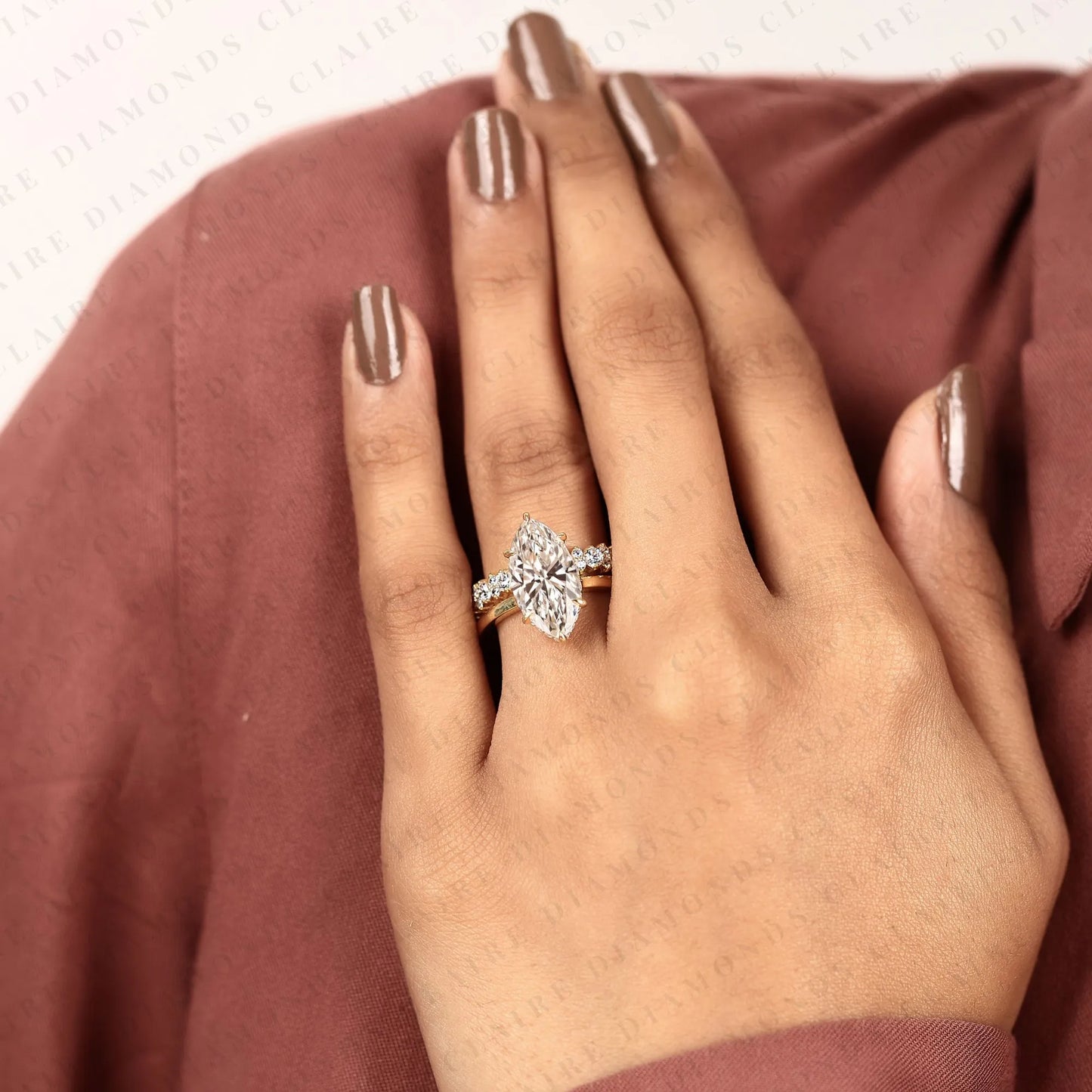 marquise cut moissanite diamond engagement ring set with eternity wedding band in 14k yellow gold