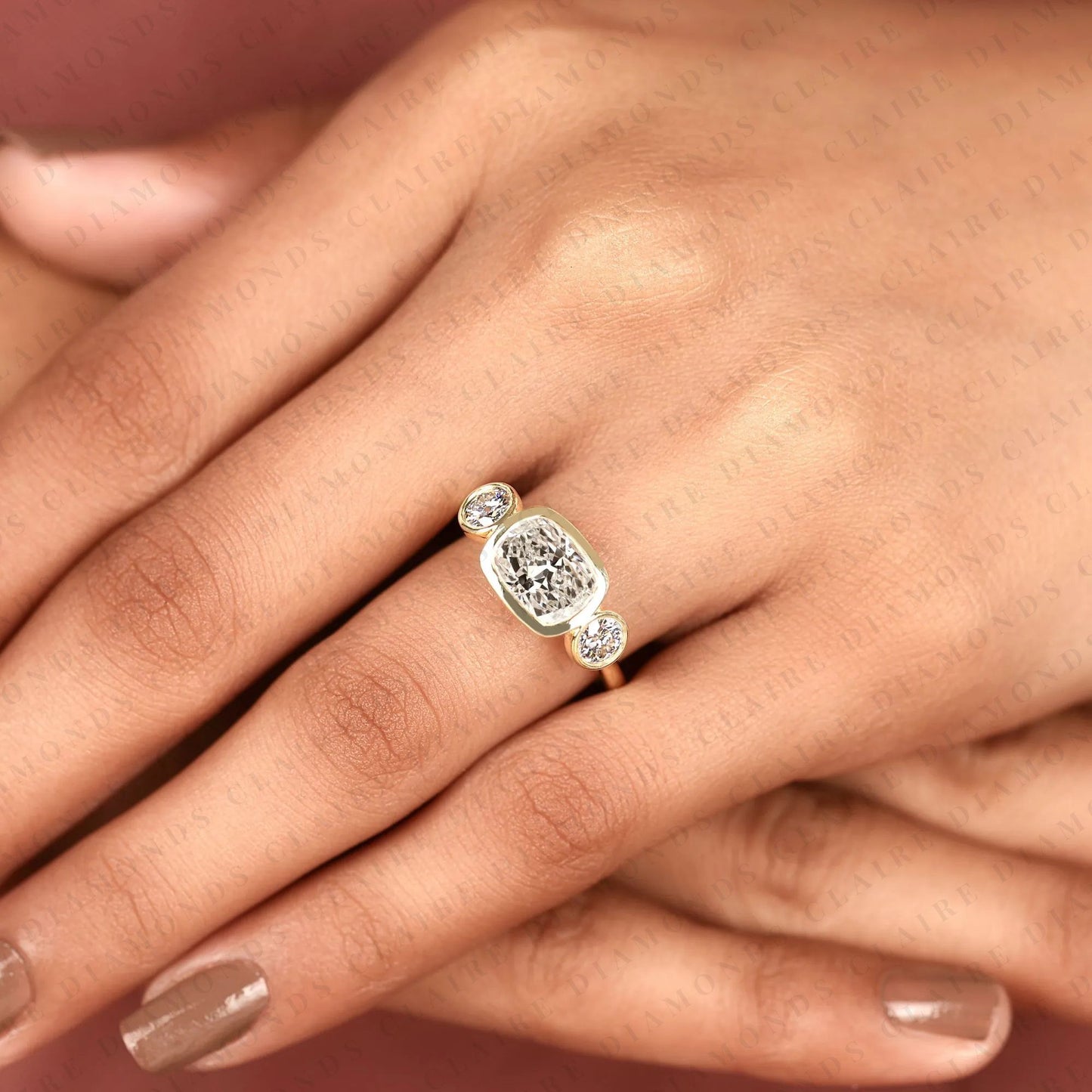 elongated cushion cut bezel set three stone moissanite diamond engagement ring modern gold ring minimalist bridal jewelry.