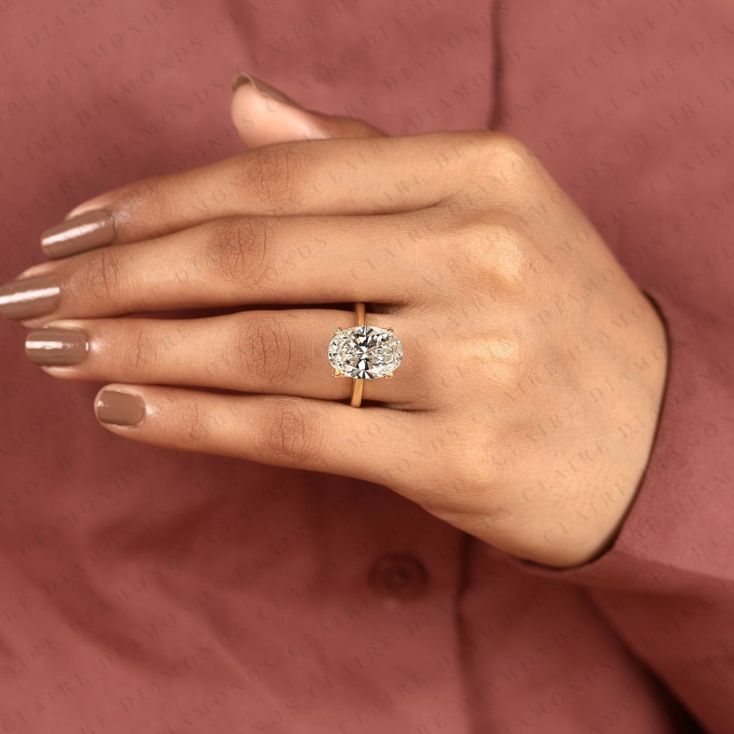 oval moissanite diamond engagement ring in gold | hidden halo ring with tulip set gold ring.
