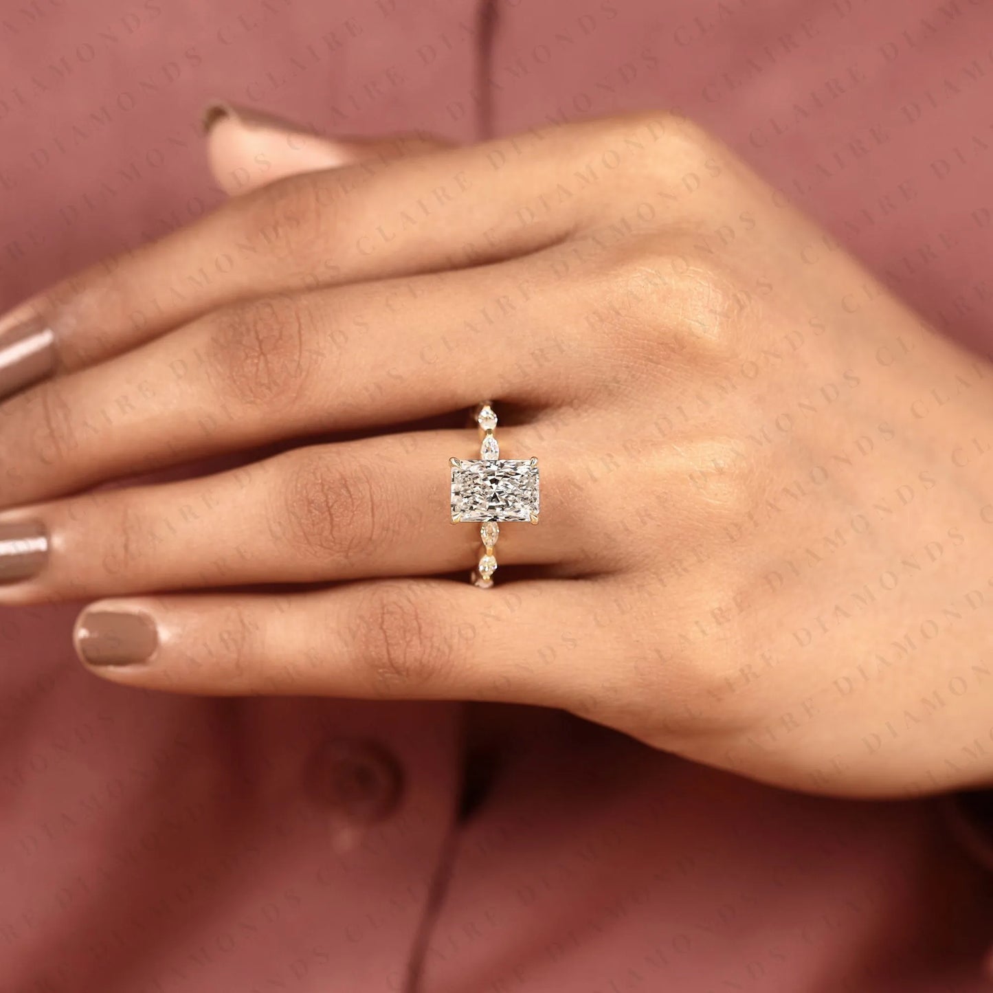 radiant cut moissanite diamond hidden halo engagement ring in yellow gold marquise accent band