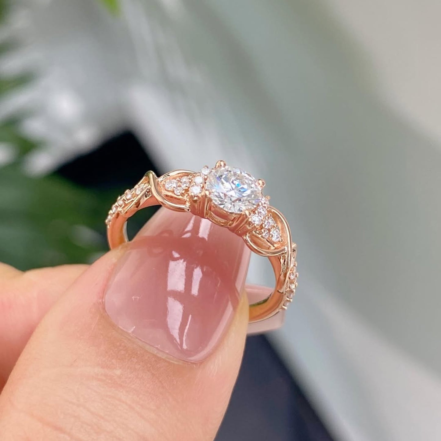 round cut diamond vintage inspired engagement ring with twisted gold band and side accents | elegant moissanite diamond ring