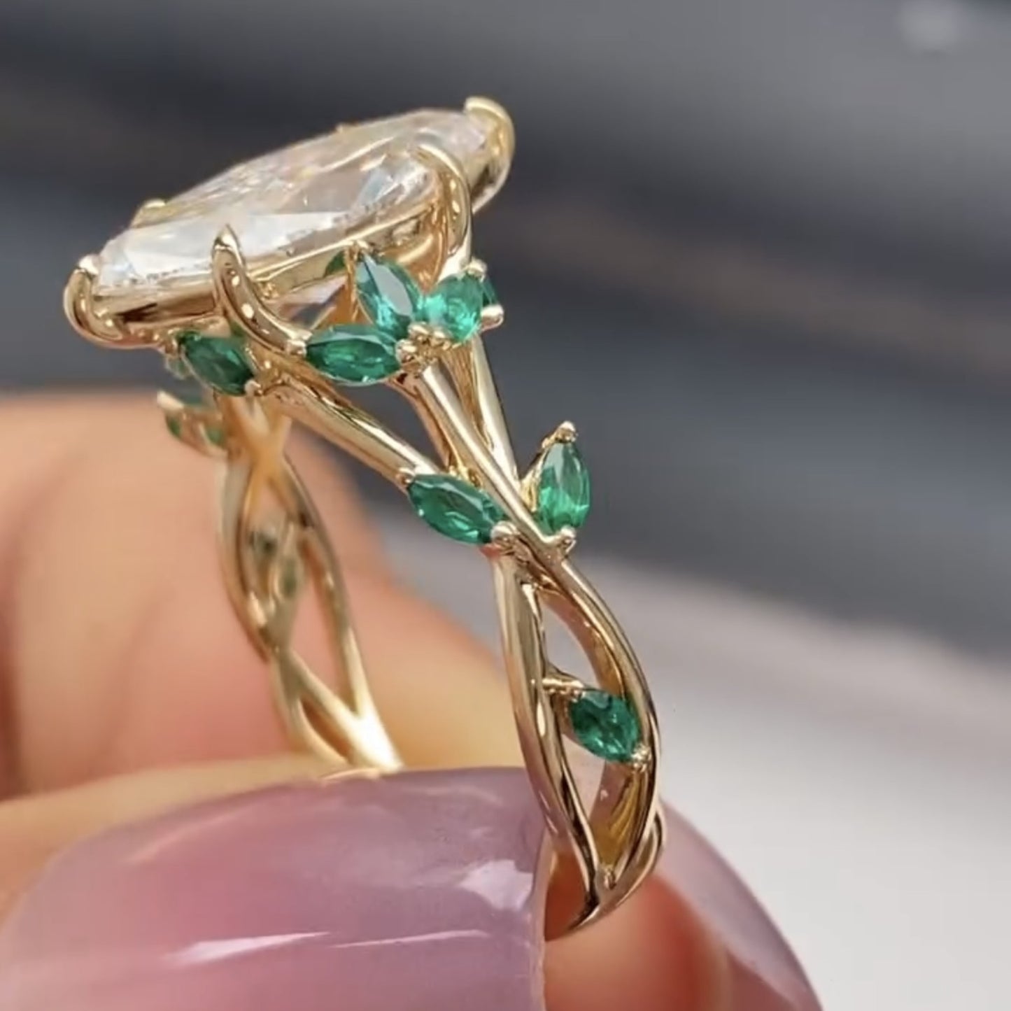 marquise cut moissanite diamond floral engagement ring with emerald accents in solid gold nature inspired vintage design