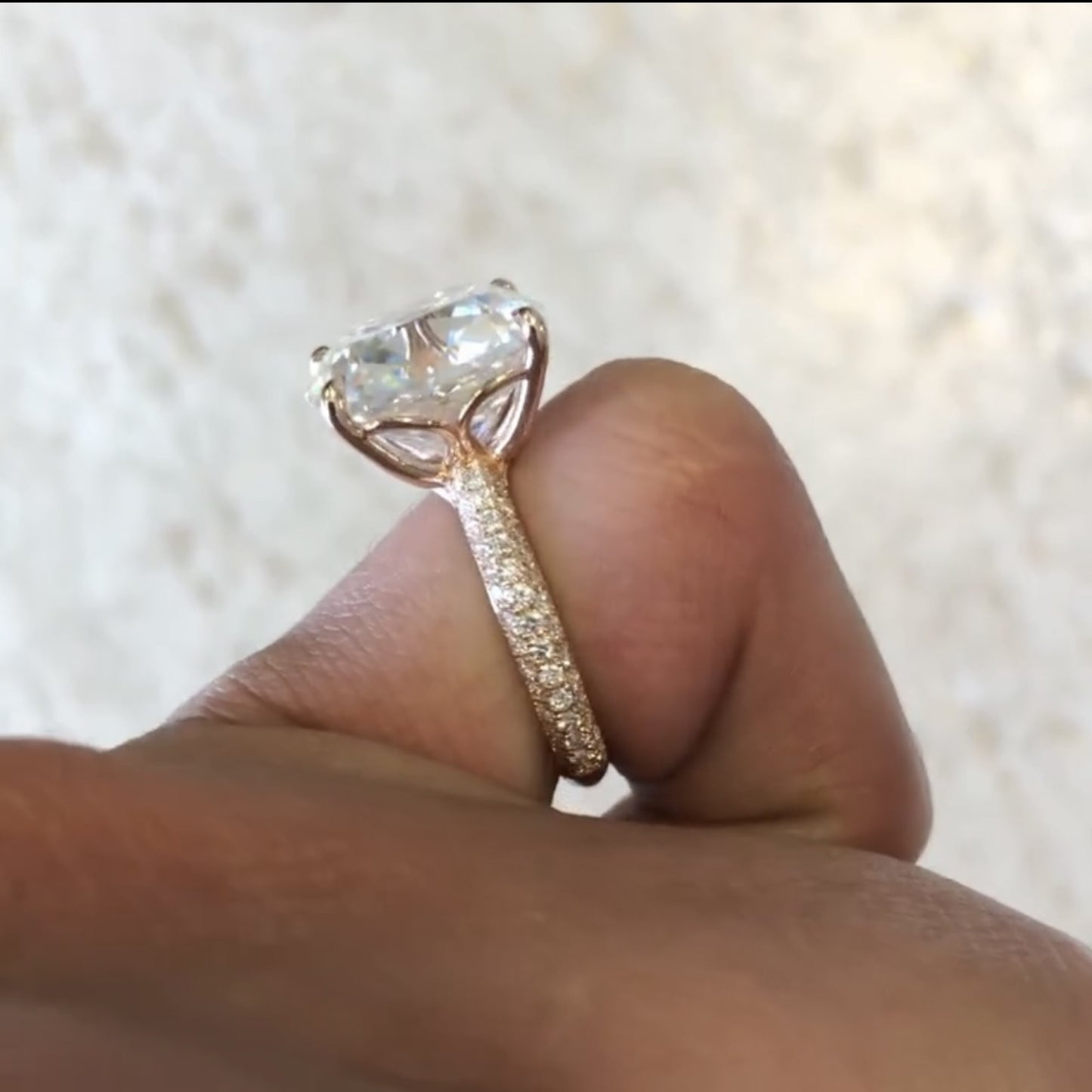 old mine elongated cushion cut moissanite diamond engagement ring with pavé band in rose gold