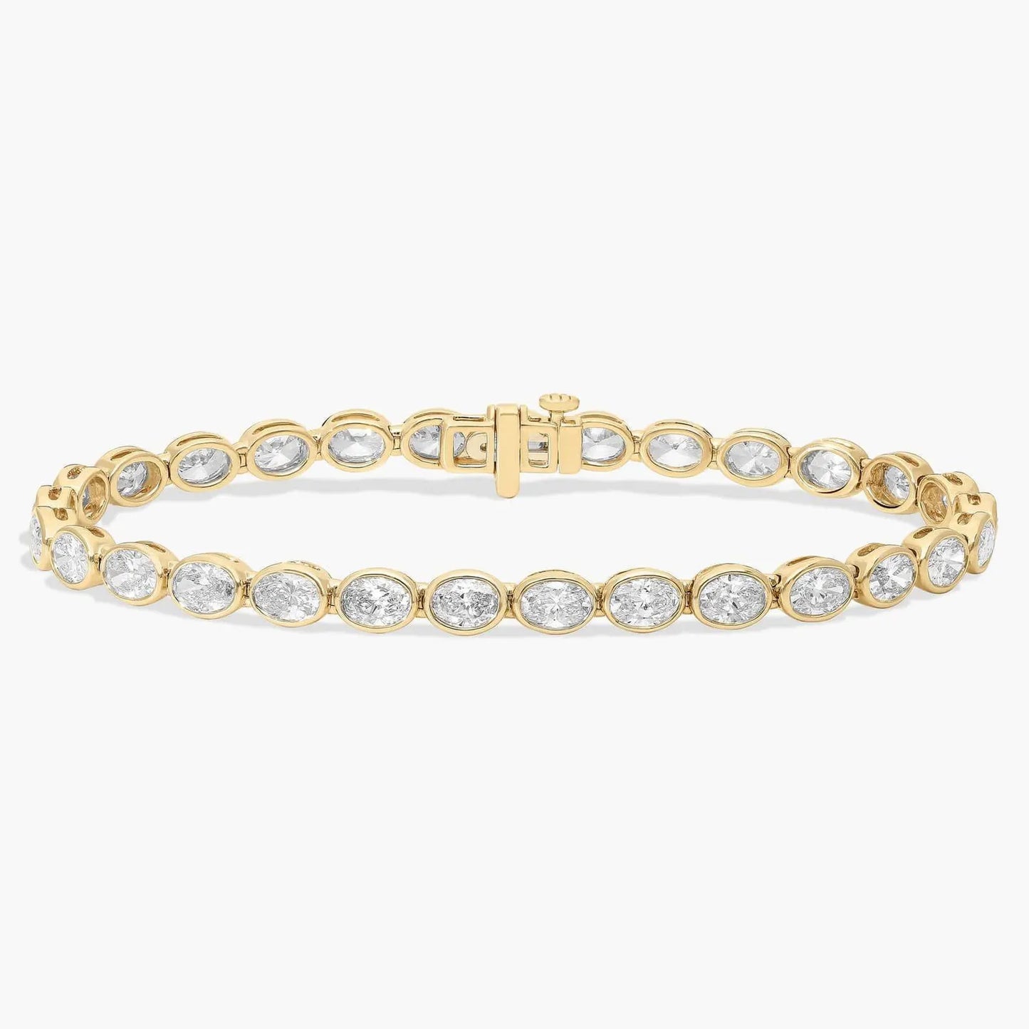 oval cut lab grown diamond tennis bracelet, with bezel set elegant gold diamond style bracelet