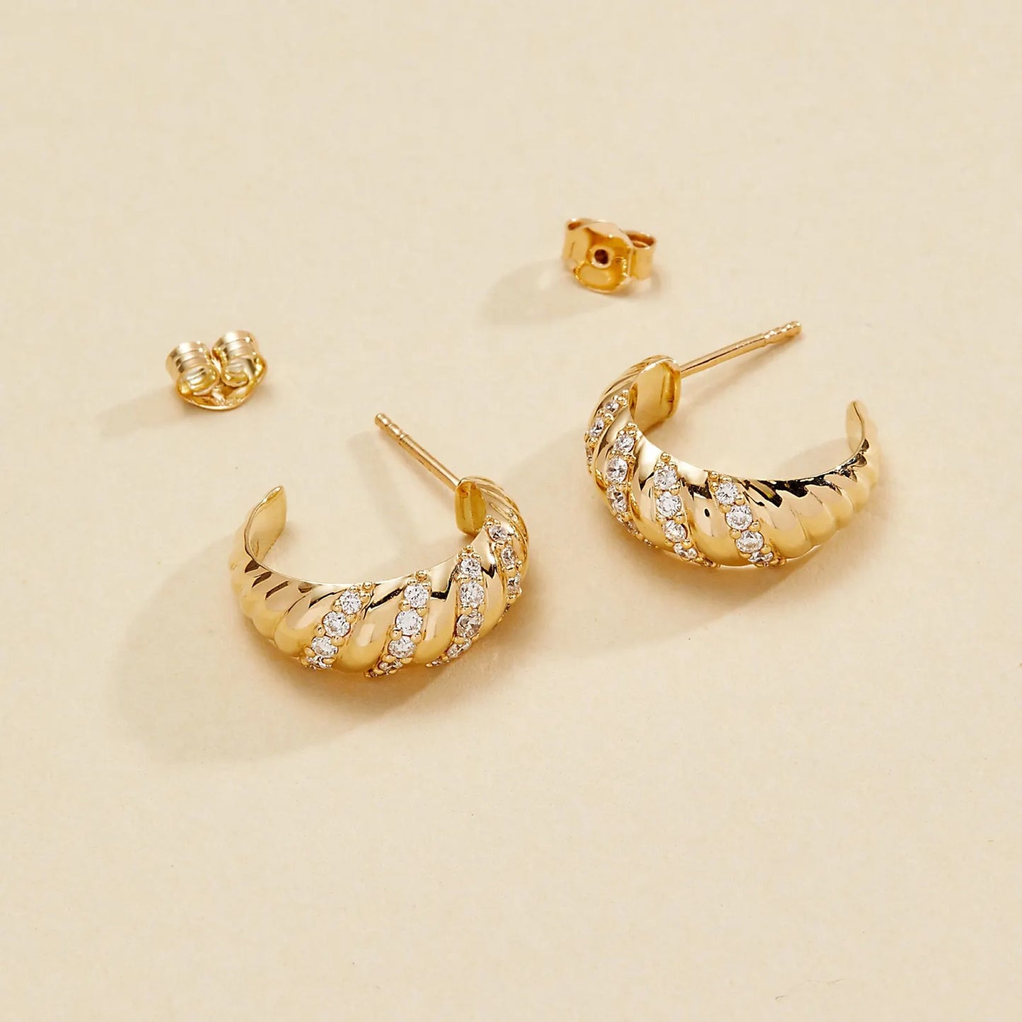 0.80 tcw round cut lab grown diamond huggie hoop earring elegant twist design