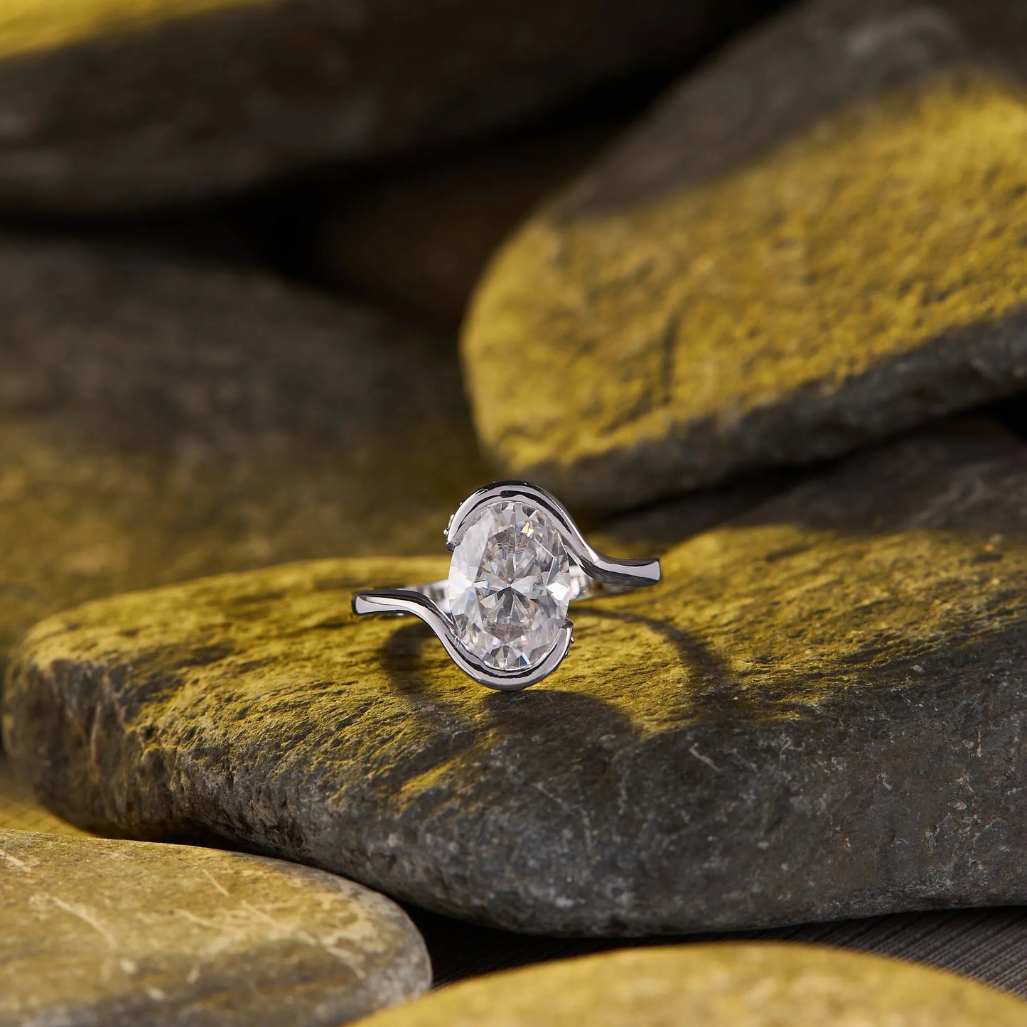 elegant oval cut moissanite diamond bypass solitaire engagement ring modern bridal design