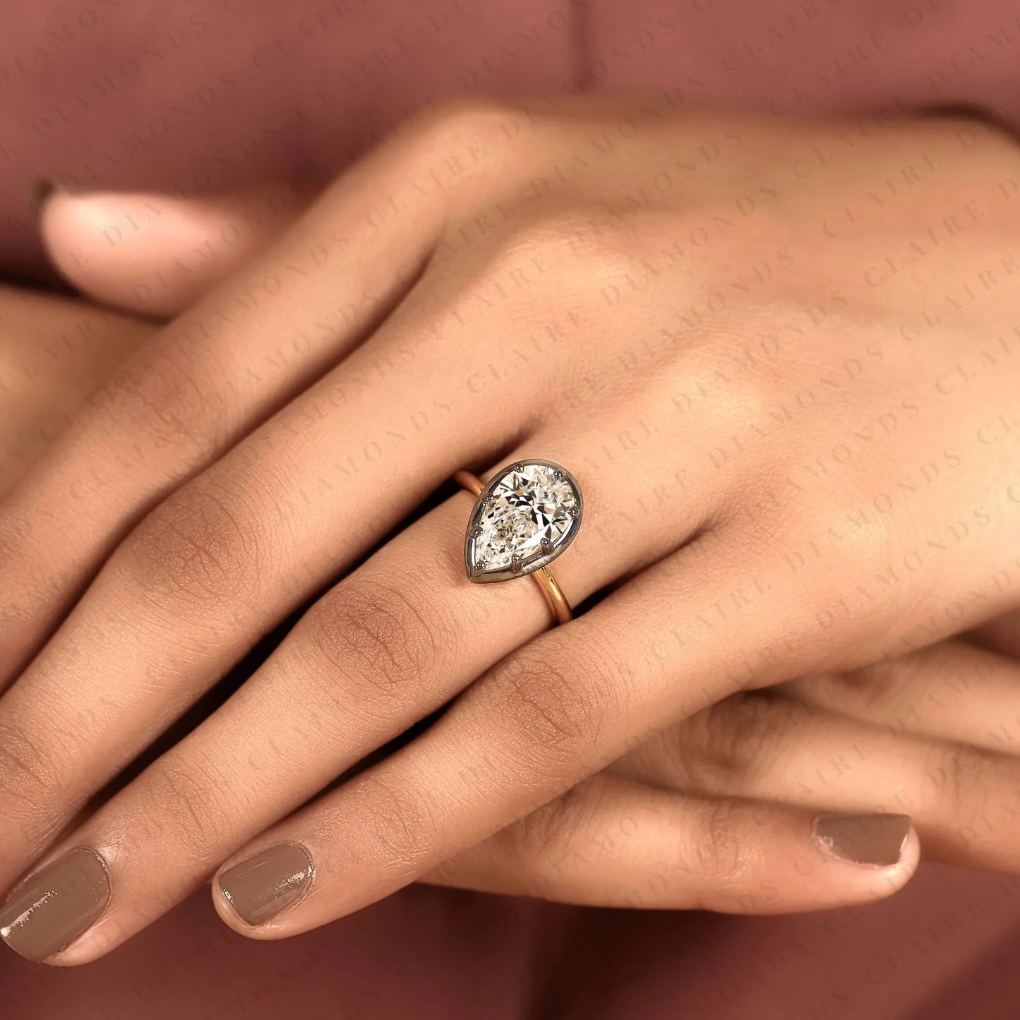 pear shape lab grown diamond solitaire ring | black bezel two-tone gold contemporary setting