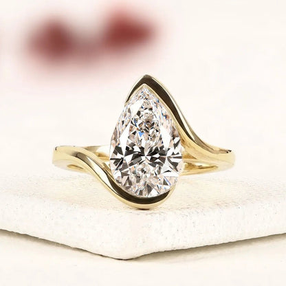 Pear Shape Lab Grown Diamond Hidden Halo Solitaire Ring with Contemporary Twist Setting