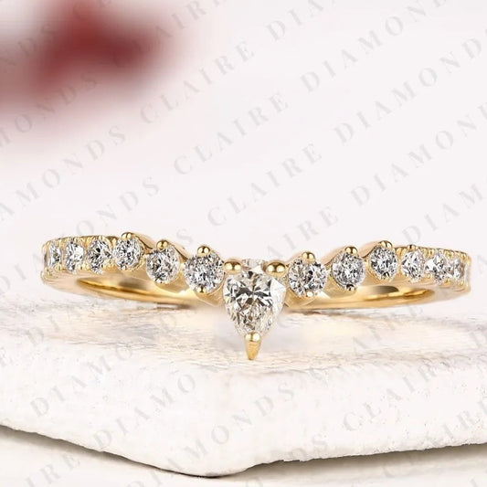 0.64 TCW Classic Pear Cut Lab Grown Diamond Anniversary Ring with Delicate Round Brilliant Diamonds and Everyday Sparkle