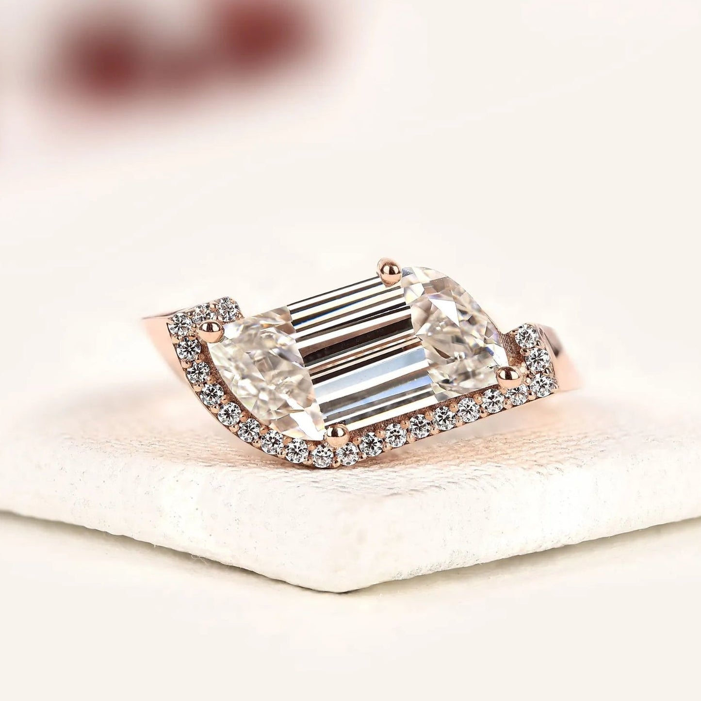 modern flame cut moissanite diamond halo engagement ring with exceptional brilliance