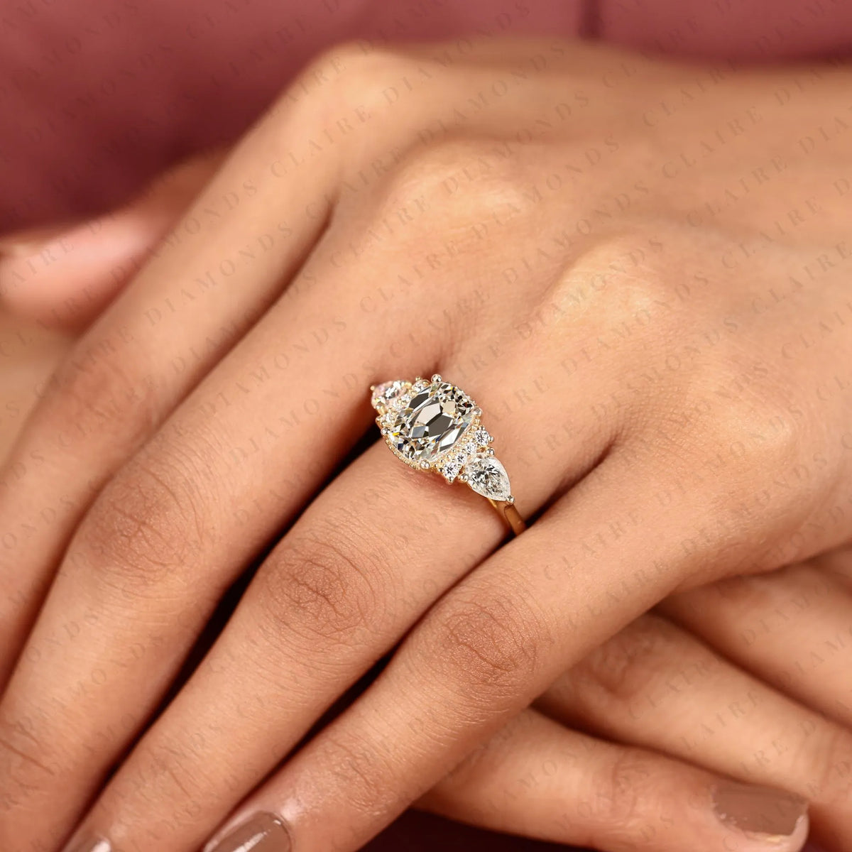 old mine elongated cushion cut moissanite engagement ring, milgrain bezel setting, pear side stone halo, yellow gold vintage inspired bridal ring