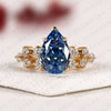 Pear Cut Blue Lab Grown Engagement Ring, Round Diamond Floral Side Stones, Yellow Gold Nature-Inspired Bridal Ring