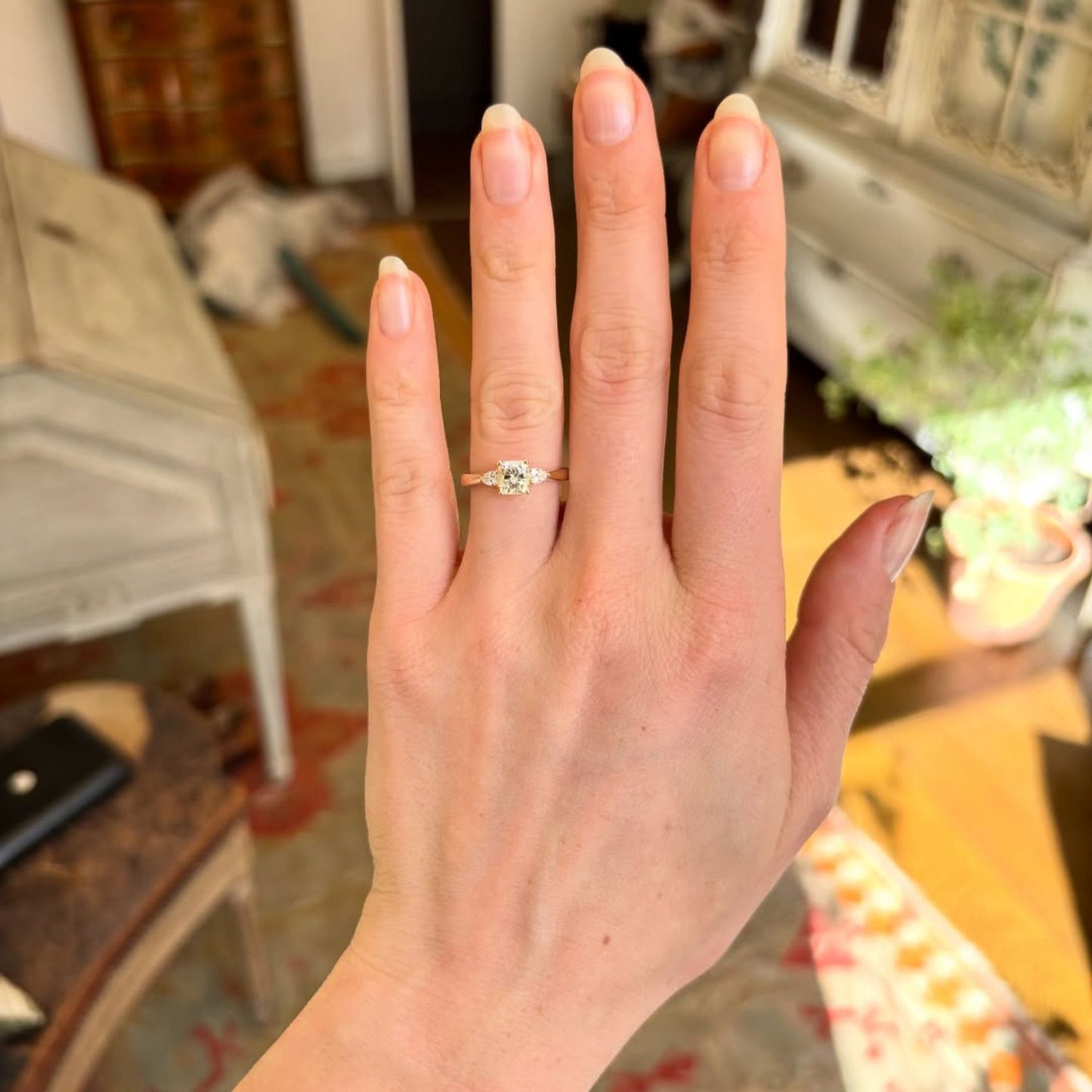 elegant cushion cut moissanite diamond three-stone ring in gold minimalist engagement ring