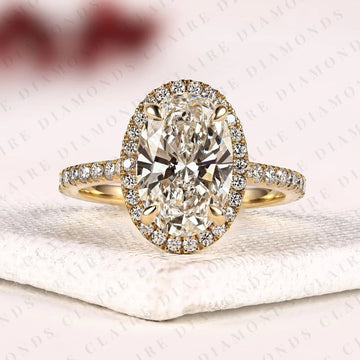 Oval Halo Ring by Claire Diamonds