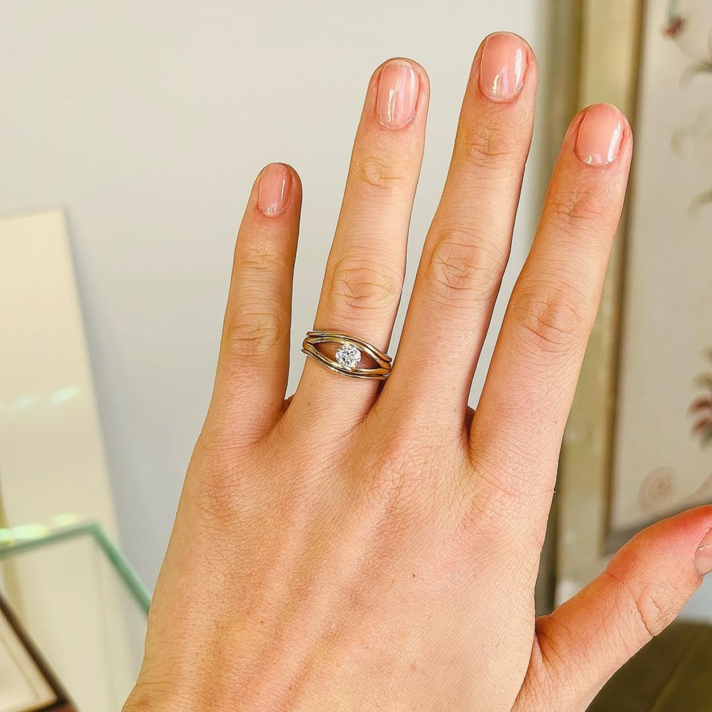 modern wave design round diamond lab grown solitaire ring in minimalist open frame engagement ring