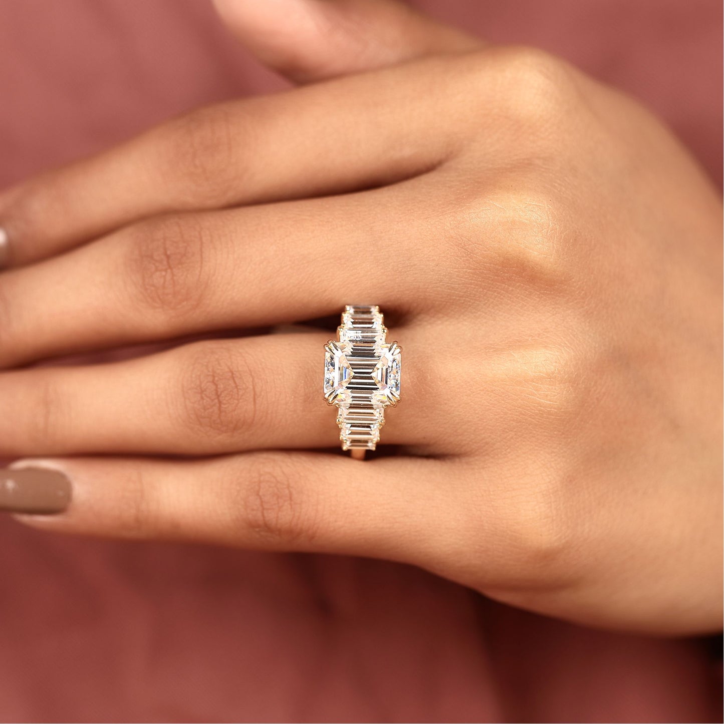 emerald cut moissanite diamond engagement ring in yellow gold | side stone baguette diamond wedding ring | luxury anniversary ring for women