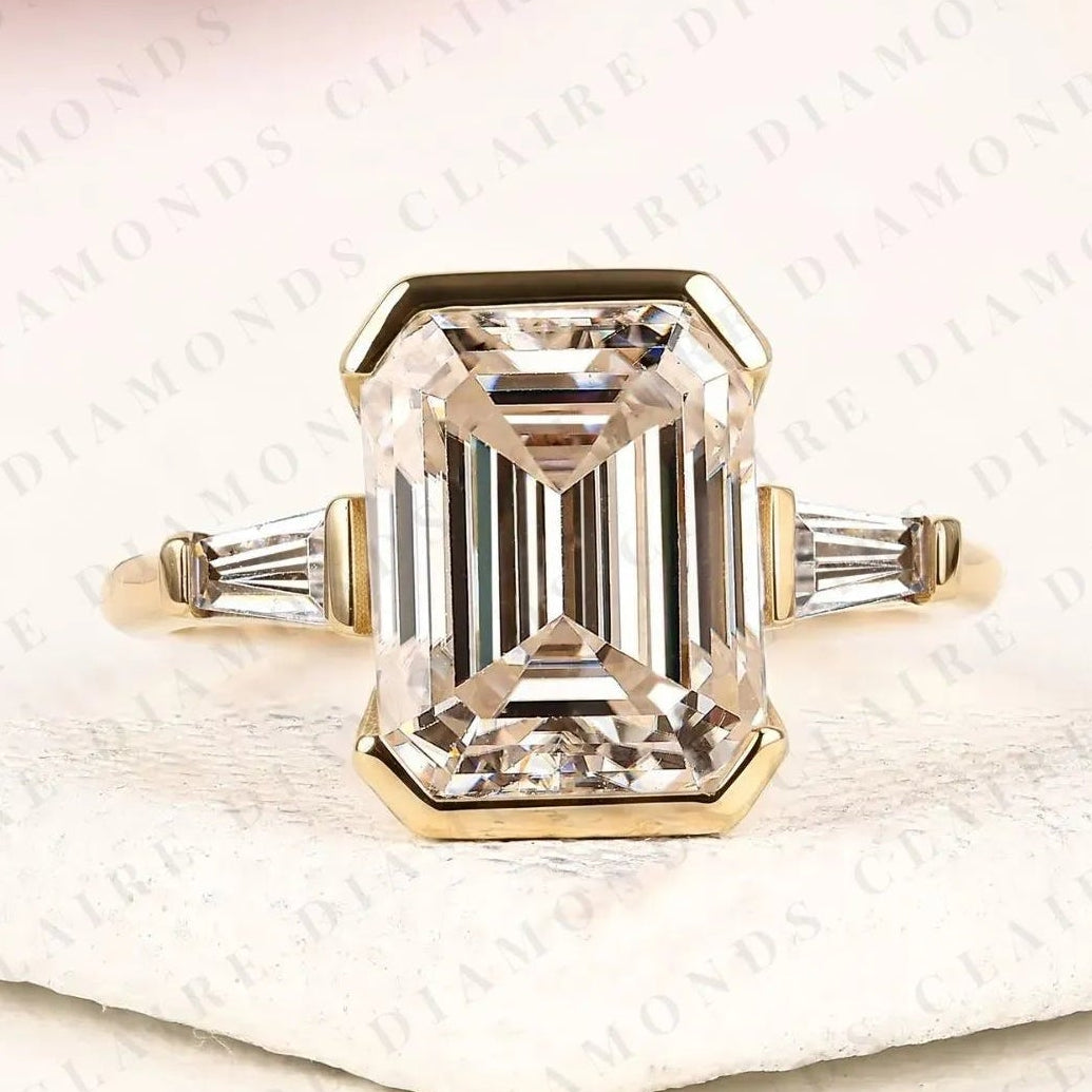 emerald cut lab grown diamond past, present & future gold ring ,half bezel & three tone engagement ring with tapered baguette side diamonds ring.