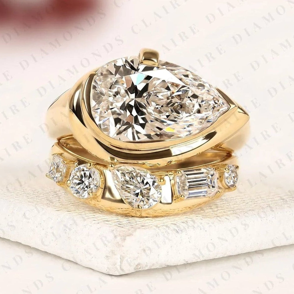 pear cut moissanite diamond bridal ring set bezel set engagement ring gold matching wedding band modern statement bridal set