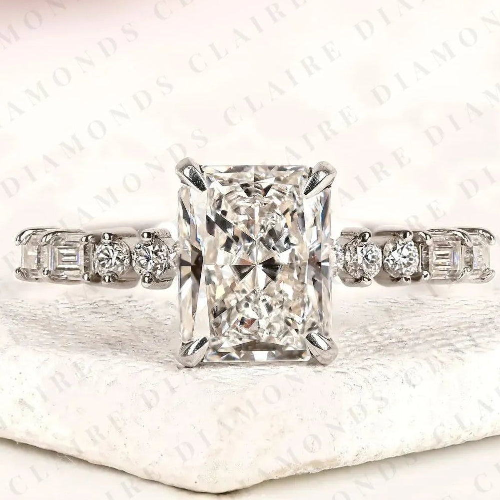 radiant cut lab grown diamond engagement ring with round and baguette side stone accents