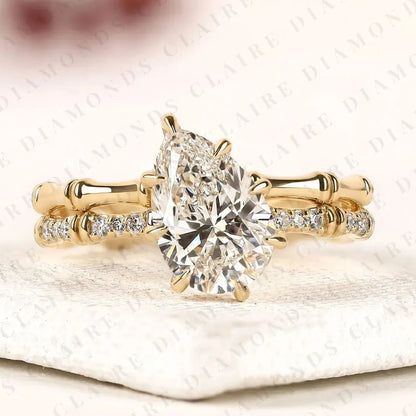 Luxury Pear Cut Lab Grown Diamond Engagement Ring with Pavé Diamond Accents and Bamboo Inspired Matching Wedding Band Set
