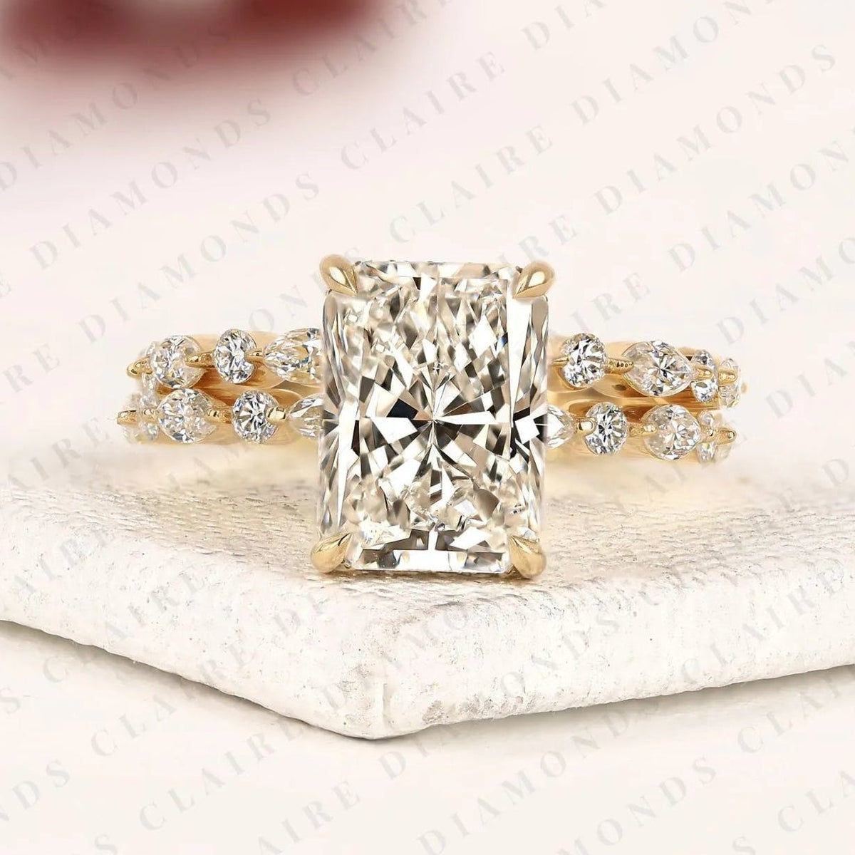 designer radiant cut lab grown bridal ring set with marquise and round diamond accents