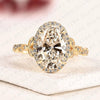 Oval Halo Moissanite Diamond Engagement Ring in Solid Gold With Twisted Vintage Band.