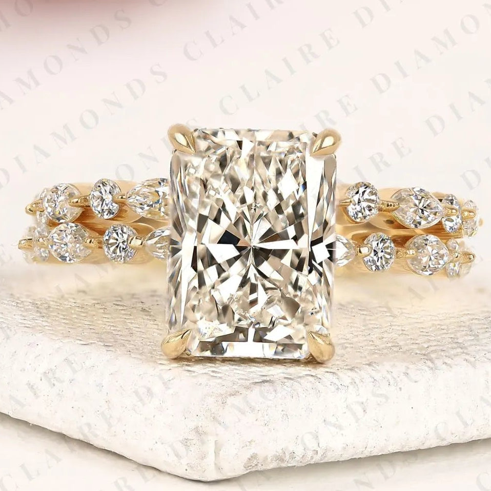 designer radiant cut moissanite bridal ring set with marquise and round diamond accents