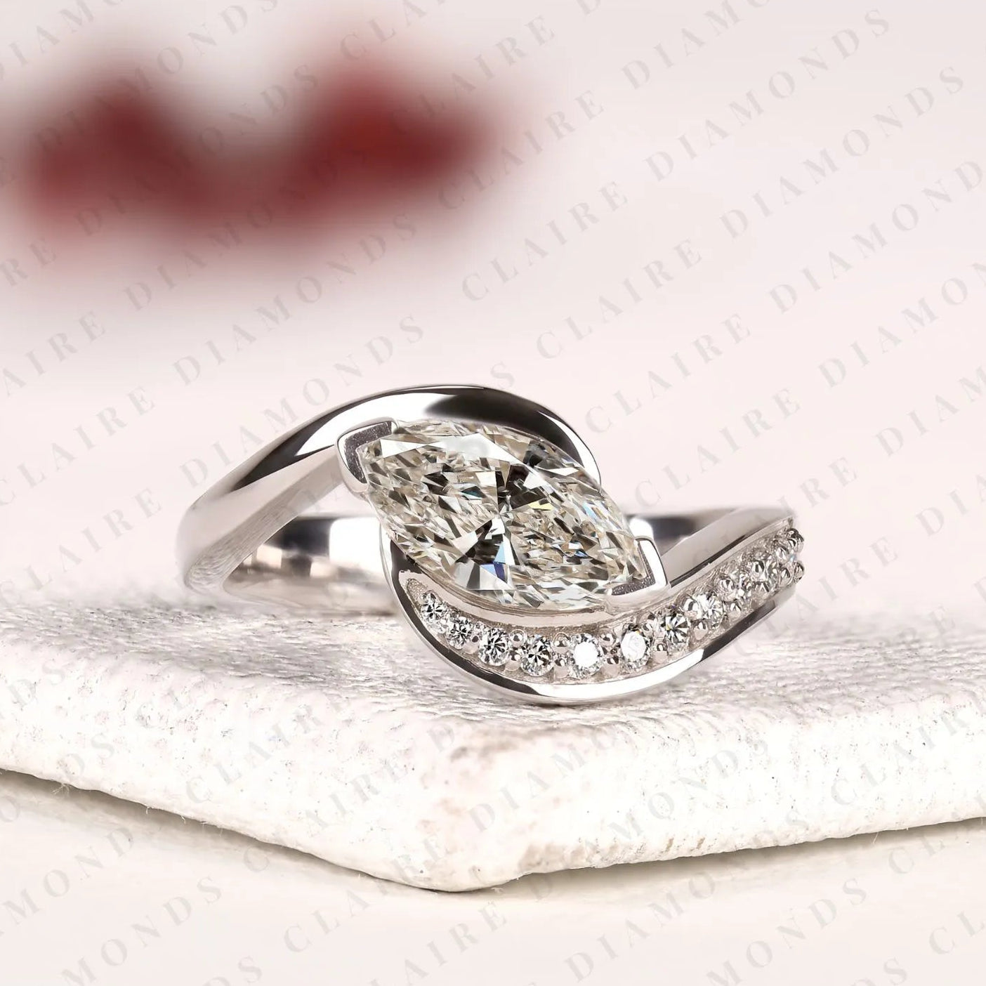 marquise cut lab grown diamond east west bypass engagement ring in gold with round side stones , modern bridal jewelry.