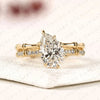 Luxury Pear Cut Lab Grown Diamond Engagement Ring with Pavé Diamond Accents and Bamboo Inspired Matching Wedding Band Set