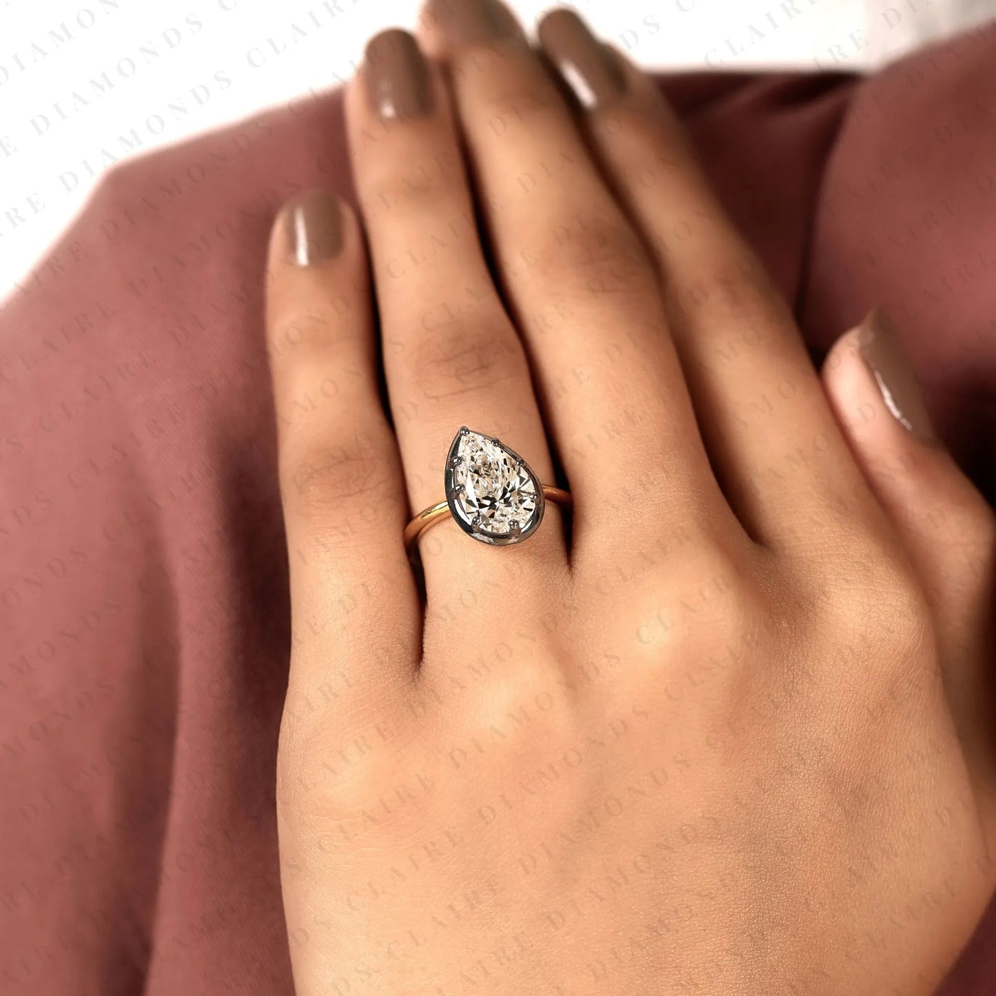 pear shape lab grown diamond solitaire ring | black bezel two-tone gold contemporary setting