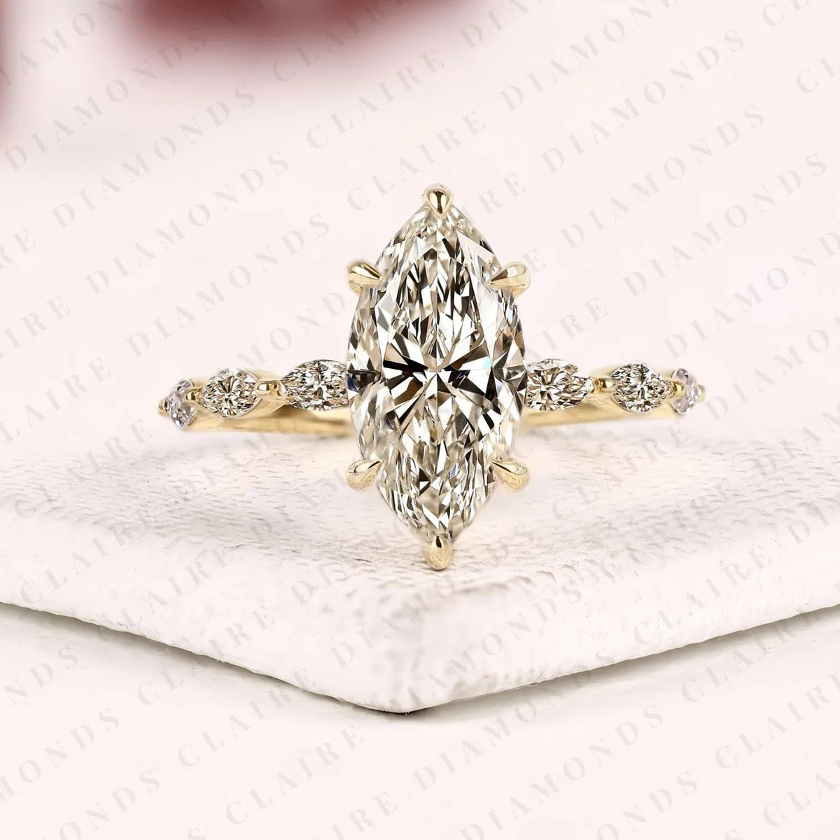 marquise cut lab grown diamond engagement ring | floral inspired diamond side stone ring | yellow gold bridal ring | elegant nature inspired wedding jewelry