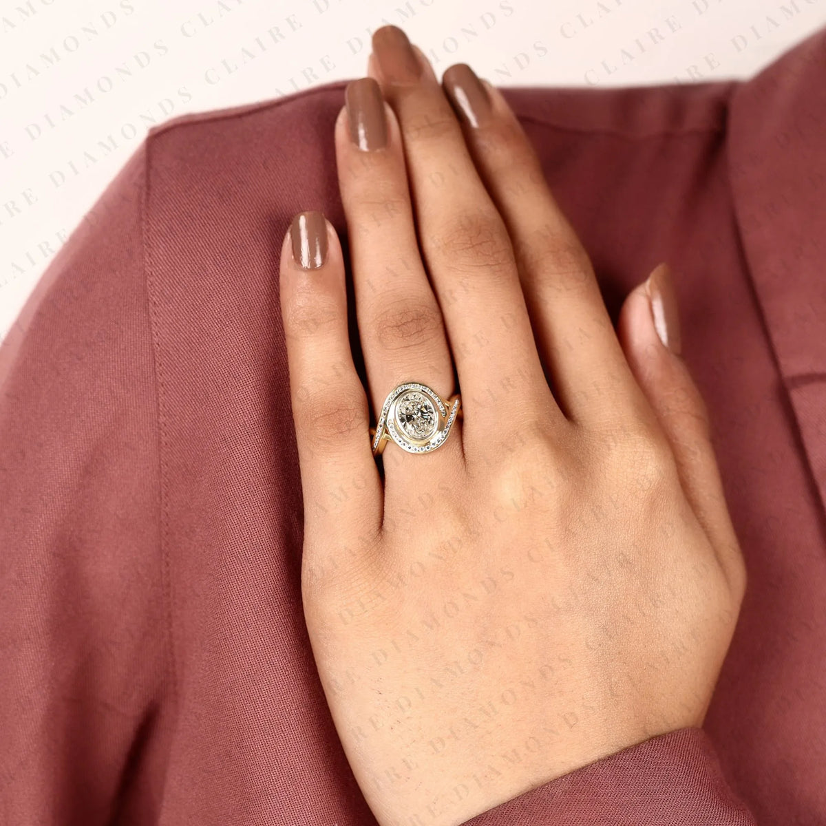 oval cut lab grown diamond engagement ring | pavé bezel halo yellow gold bypass ring | twisted split shank bridal jewelry | modern statement ring