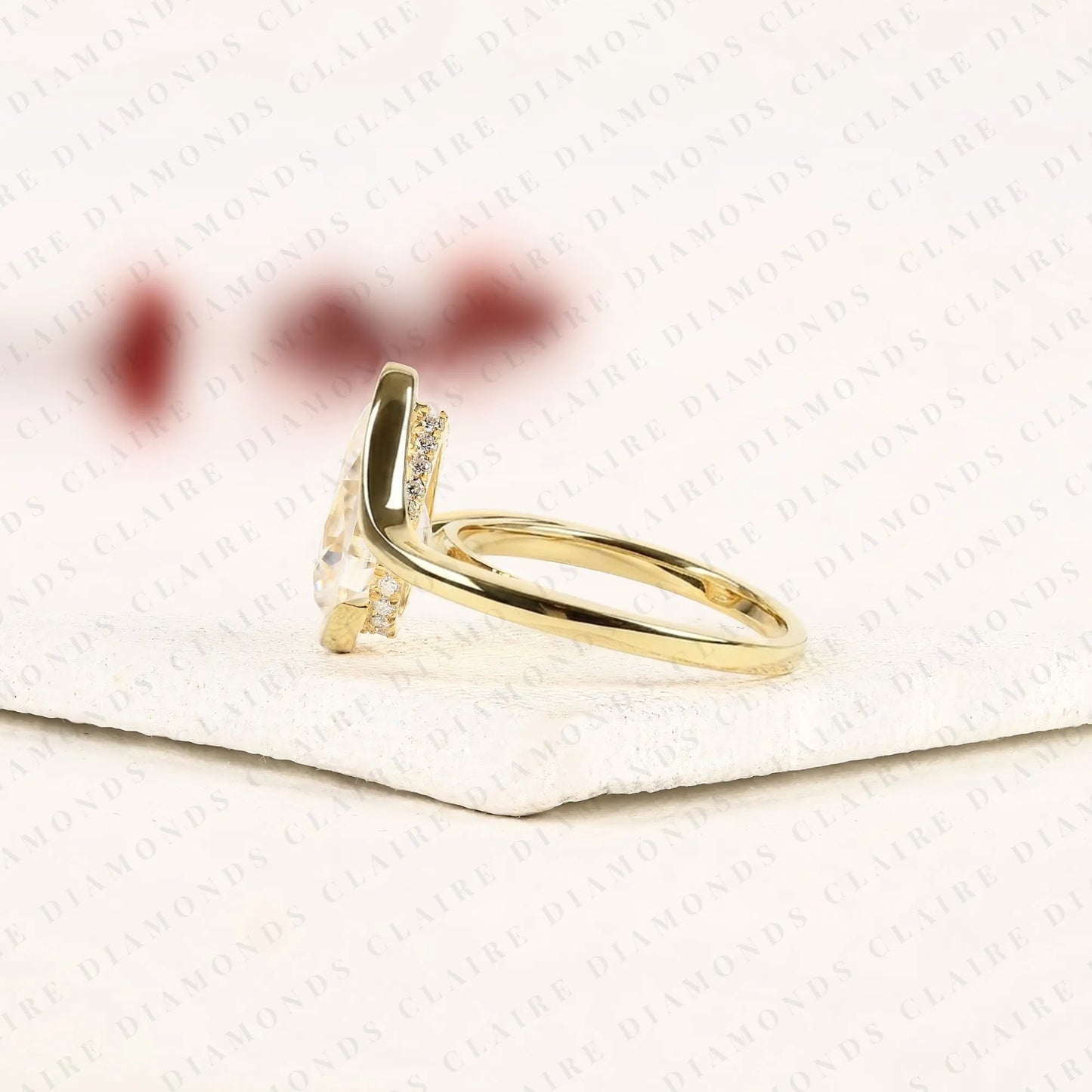 pear shape lab grown diamond hidden halo solitaire ring with contemporary twist setting