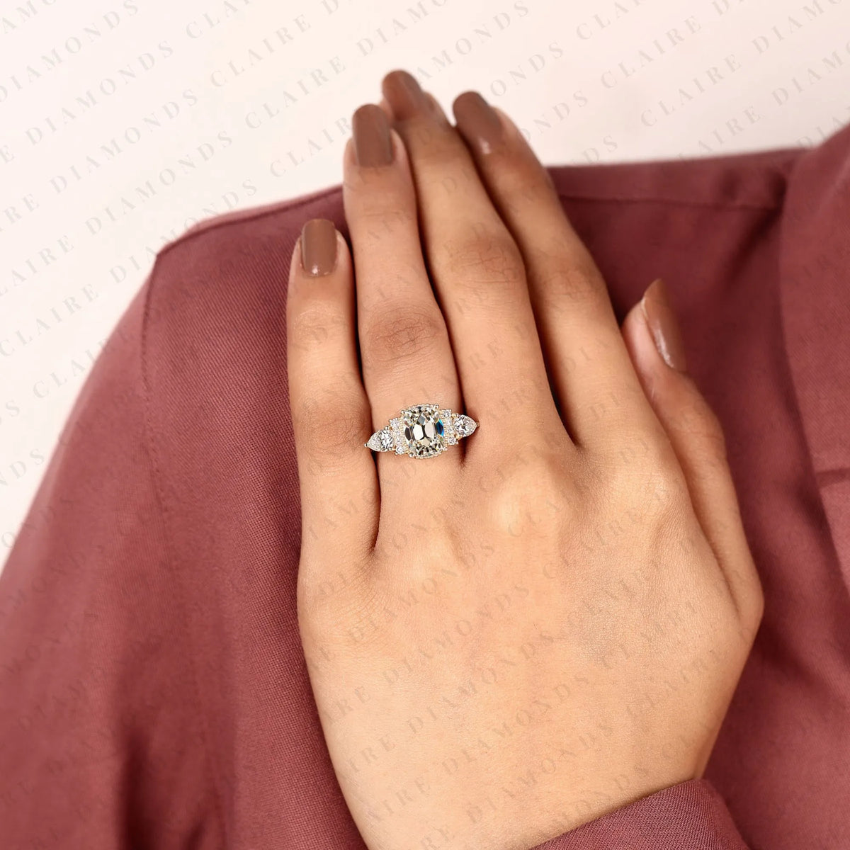 old mine elongated cushion cut moissanite engagement ring, milgrain bezel setting, pear side stone halo, yellow gold vintage inspired bridal ring