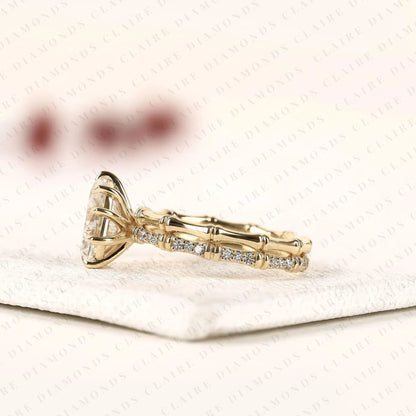 Luxury Pear Cut Lab Grown Diamond Engagement Ring with Pavé Diamond Accents and Bamboo Inspired Matching Wedding Band Set
