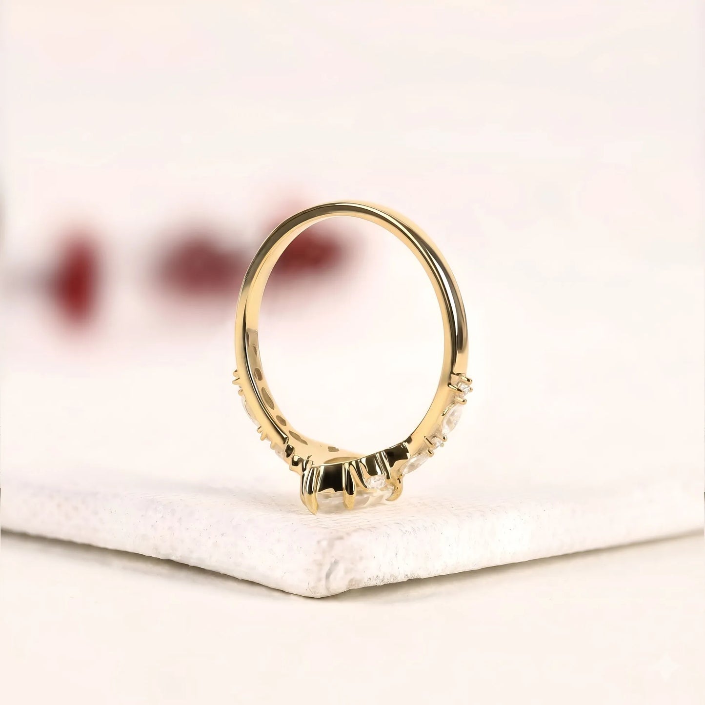 marquise cut lab grown diamond engagement ring with side accent diamonds | elegant three stone bridal ring in white gold