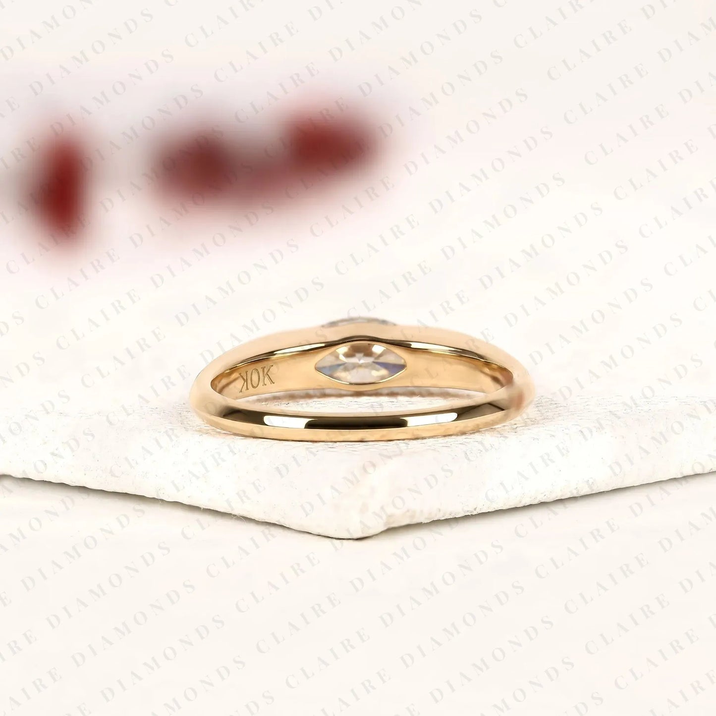 minimalist marquise cut solitaire lab grown diamond engagement ring in yellow gold | modern bezel-inspired promise ring for women.
