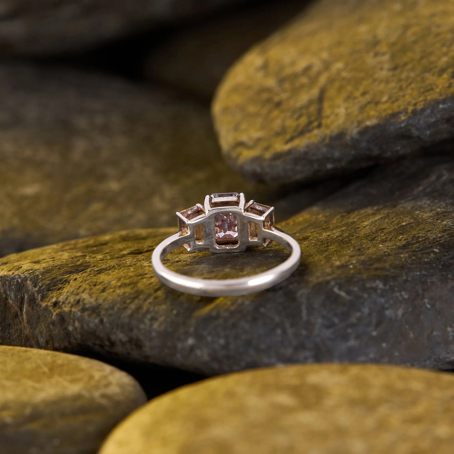 elegant emerald cut pink & champagne yellow moissanite diamond three stone engagement ring in gold