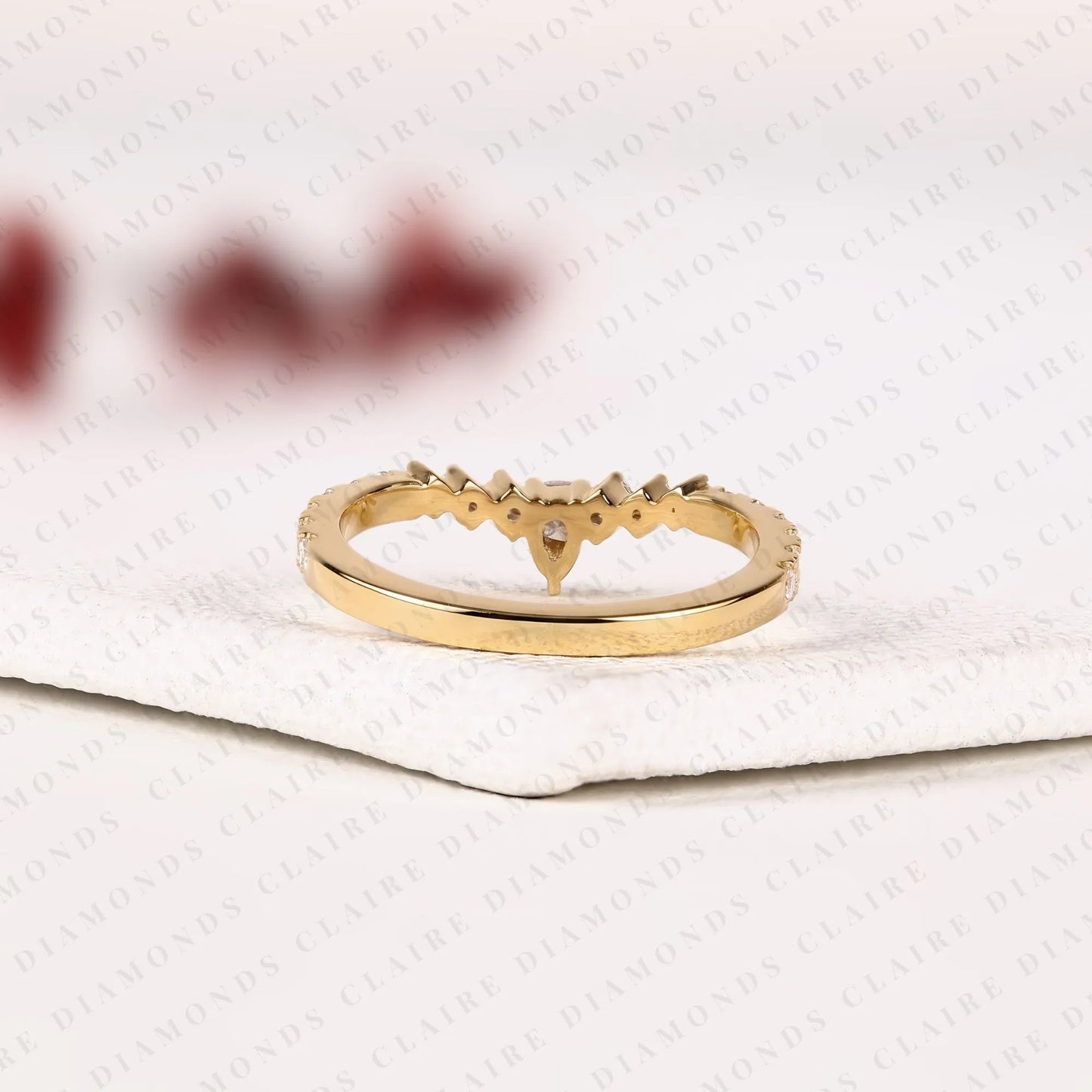 0.64 tcw classic pear cut lab grown diamond anniversary ring with delicate round brilliant diamonds and everyday sparkle