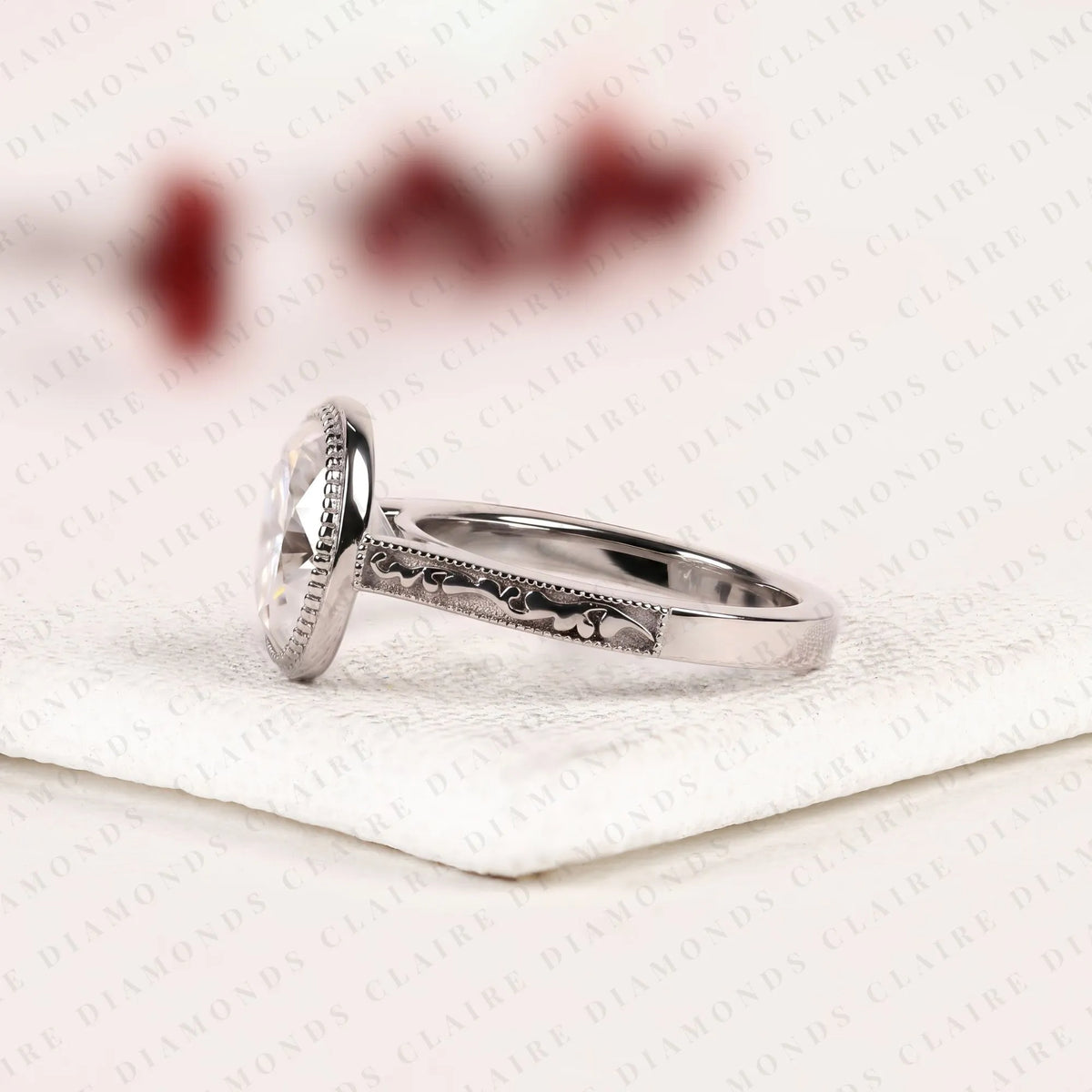 oval cut lab grown diamond engagement ring vintage milgrain bezel setting white gold engraved band elegant solitaire bridal jewelry
