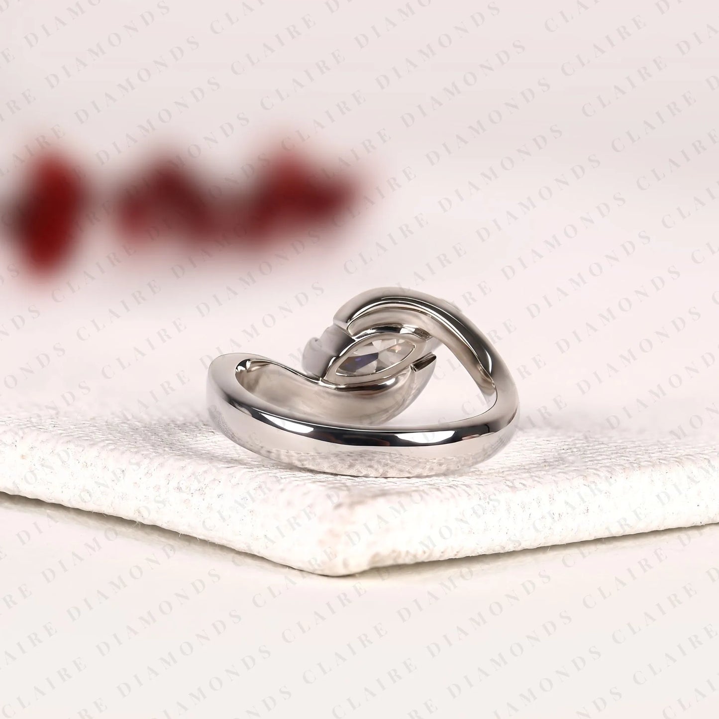 marquise cut lab grown diamond east west bypass engagement ring in gold with round side stones , modern bridal jewelry.