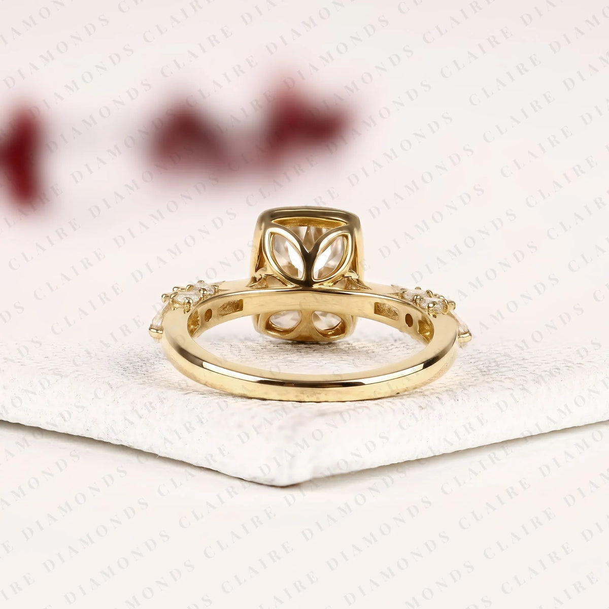 old mine elongated cushion cut lab grown diamond engagement ring yellow gold bezel ring with baguette side stone modern luxury bridal jewelry