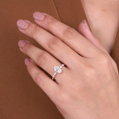 Elegant Oval Cut Lab Grown Diamond Engagement Ring with Marquise Side Stones in White Gold