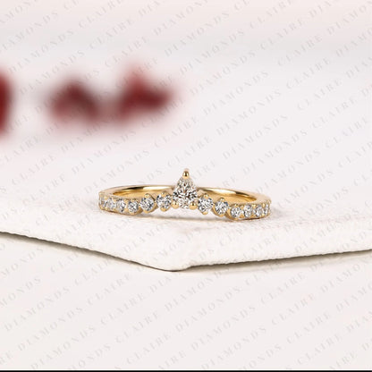 0.64 TCW Classic Pear Cut Lab Grown Diamond Anniversary Ring with Delicate Round Brilliant Diamonds and Everyday Sparkle
