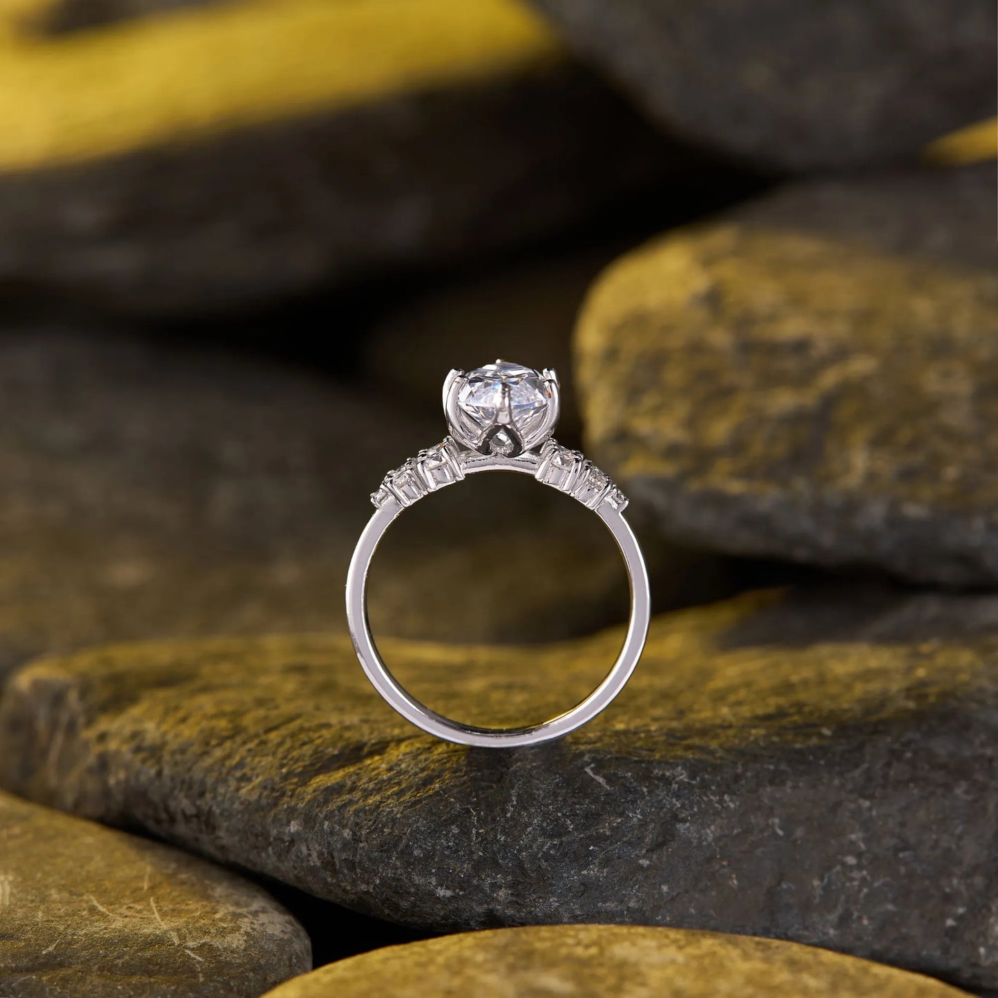 timeless marquise lab grown diamond ring with delicate sparkling side stone detailing and elegant engagement ring